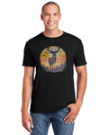 Man wearing black tee with buck at sunset design