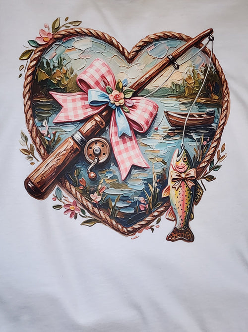 Woman wearing white tee with fishing heart coquette design