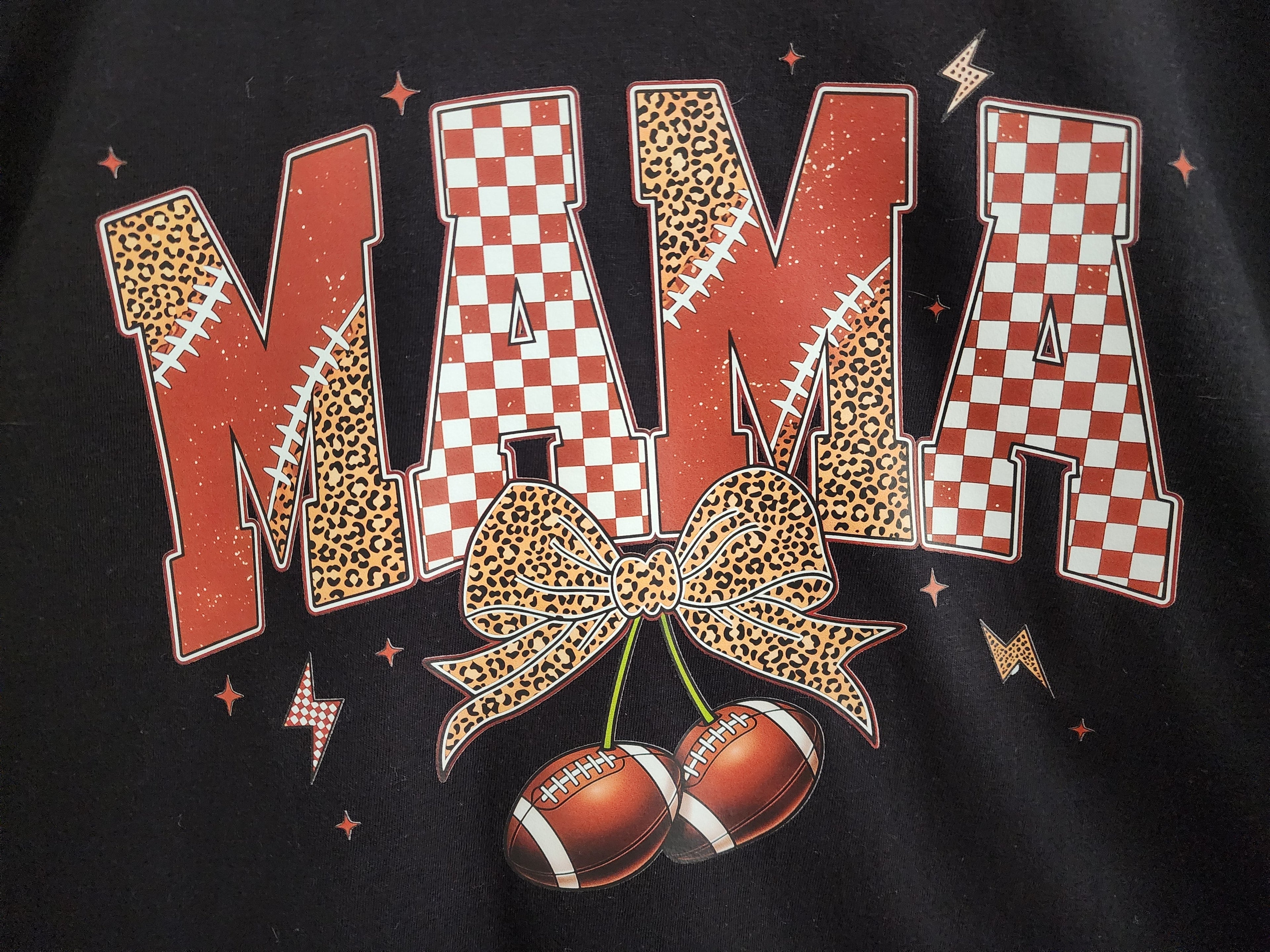 Football Mama with Cherries DTF print close-up - leopard checkered MAMA with bow and football cherries