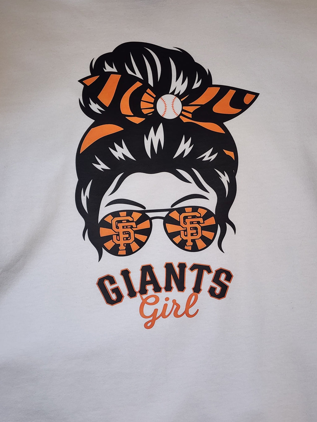 Close-up of Giants Girl messy bun print with baseball bandana and logo sunglasses